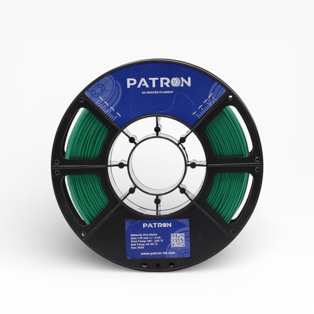 Emerald green matte PLA filament from Patron 3D filaments, showing a spool of vibrant green 3D printing filament.