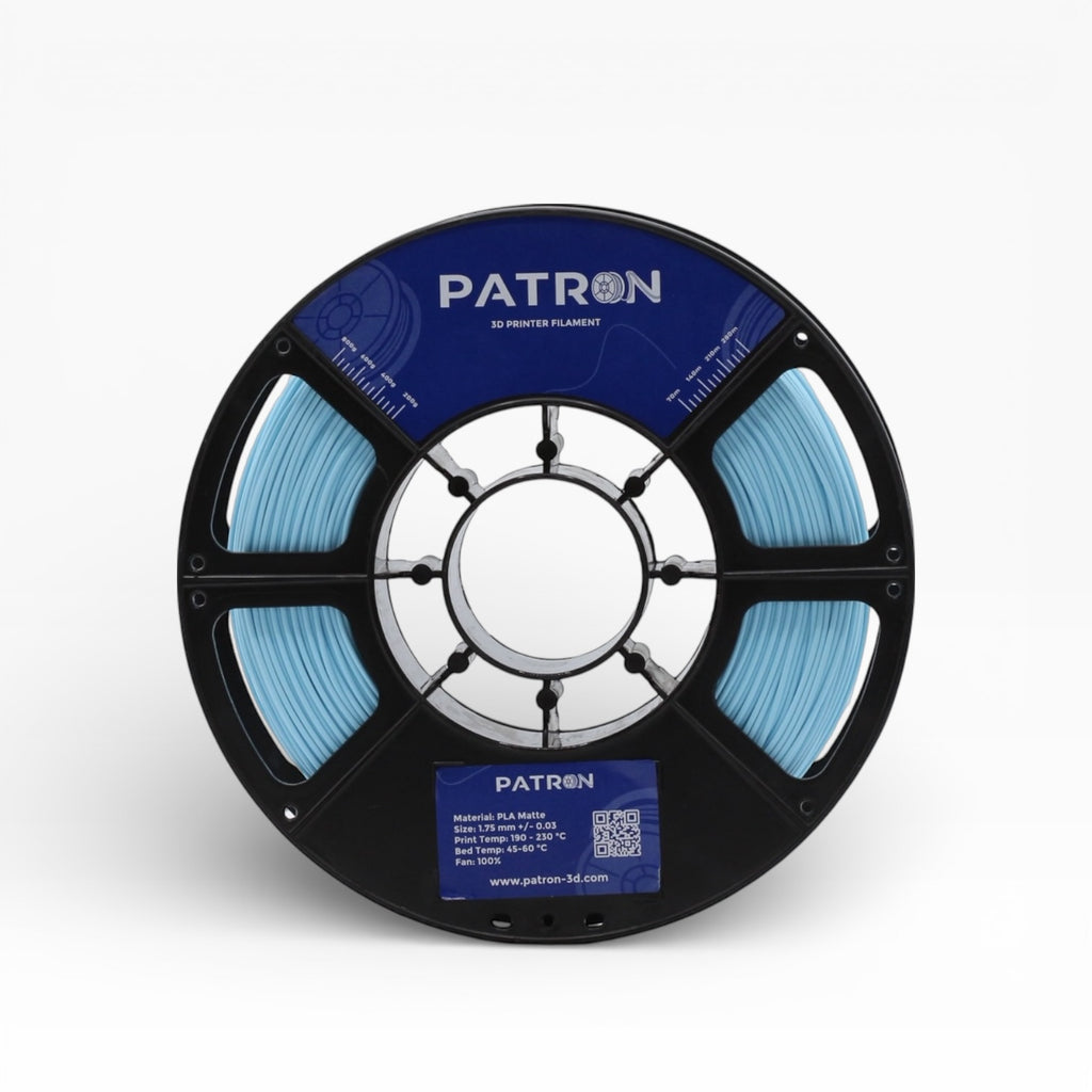Light blue matte PLA filament by Patron 3D filaments, showing a spool of smooth, light blue 3D printing filament.