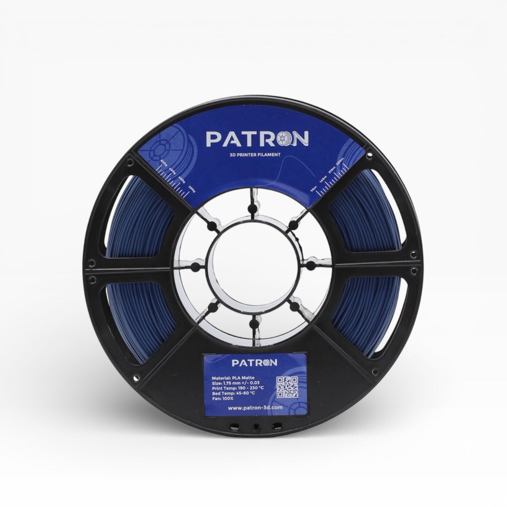 Navy blue matte PLA filament from Patron 3D Filaments, showing a spool of 3D printing filament with a smooth matte finish.