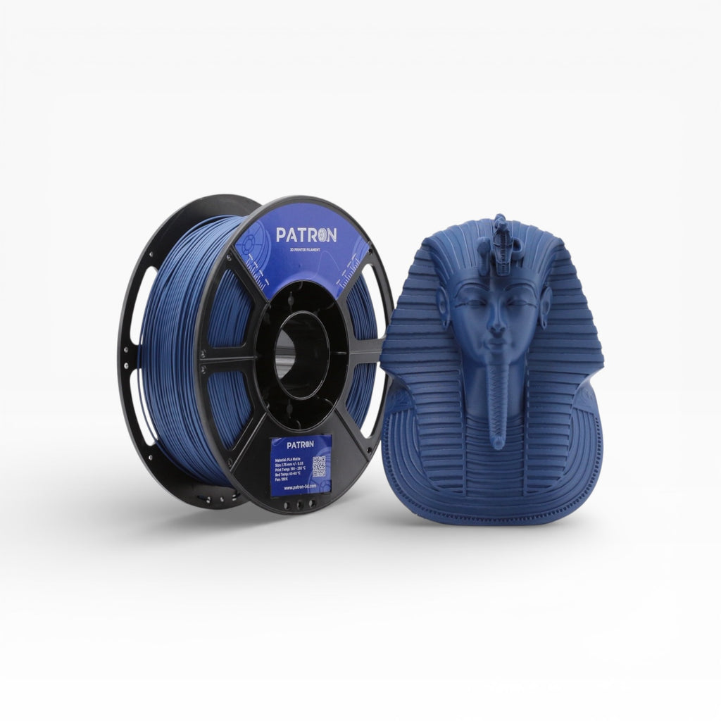 Navy blue matte PLA filament spool by Patron 3D Filaments, showing the textured navy blue filament wound on the spool