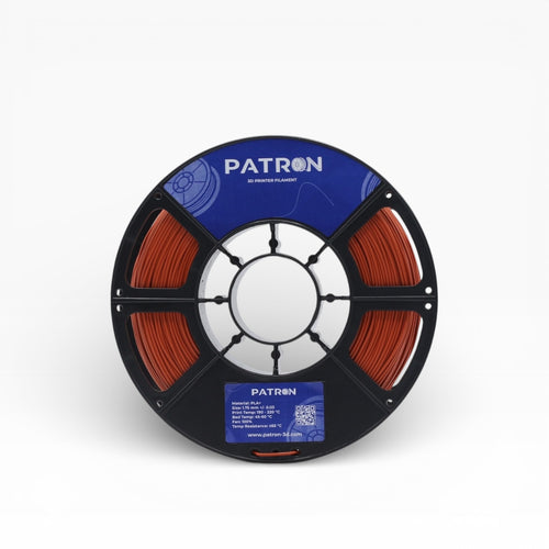 Brick PLA+ filament spool from My Store, showing bright orange 3D printing filament with detailed labeling and spool design.