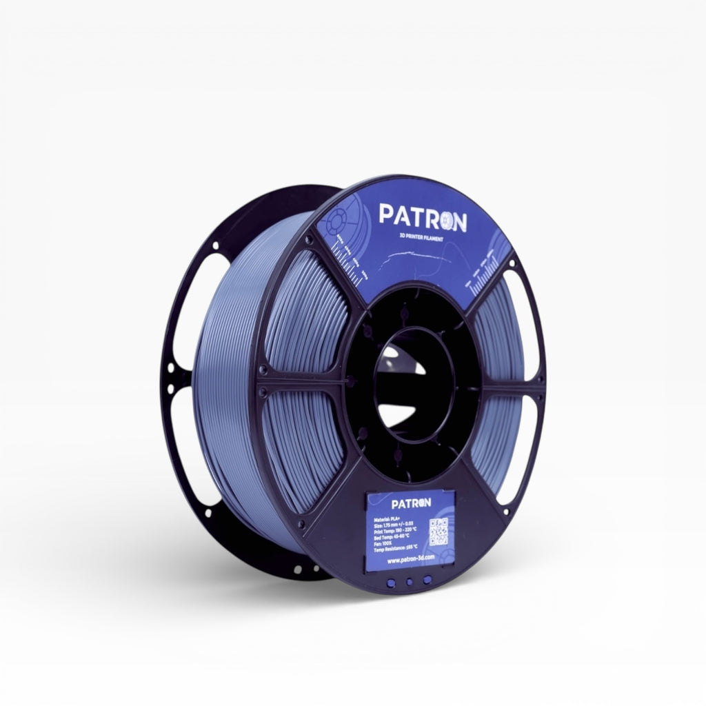 Grey PLA+ filament spool from My Store, showing the 3D printing material with a clear view of the filament roll.