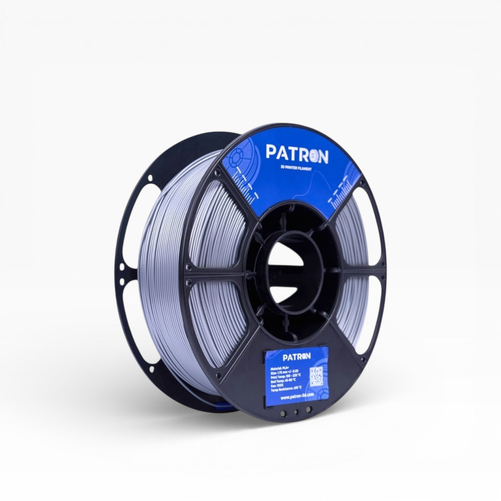 Silver PLA+ filament roll from My Store, showcasing the smooth, shiny spool of 3D printing filament for creative projects.