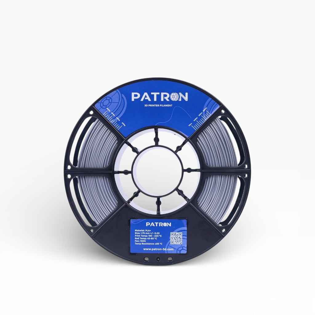 Silver PLA+ filament spool from My Store, showing the coiled filament on a spool for 3D printing.